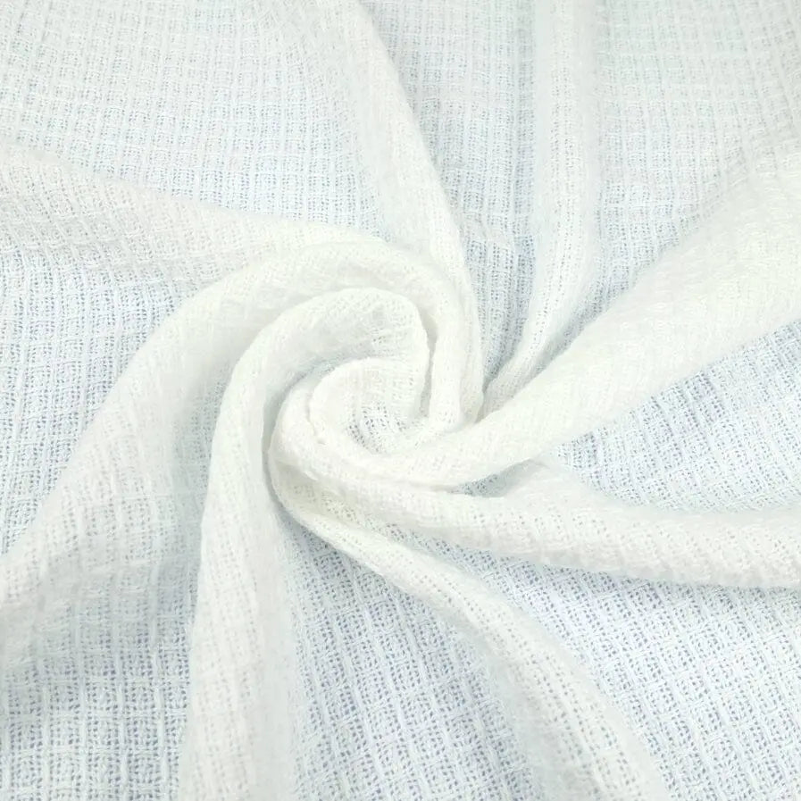 White waffle baby blanket by Muslinz, close-up of texture