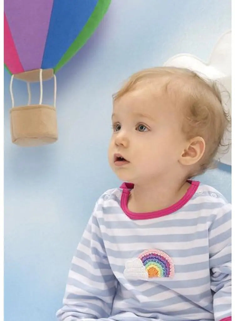 Albetta crochet rainbow babygrow laid flat, newborn gift