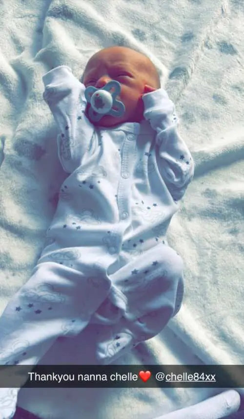 100% cotton cloud and stars sleepsuit by Soft Touch, close-up of print