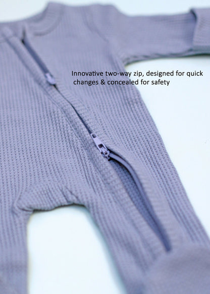 Zipped premature baby sleepsuit with fold-over mitts in blue, front view