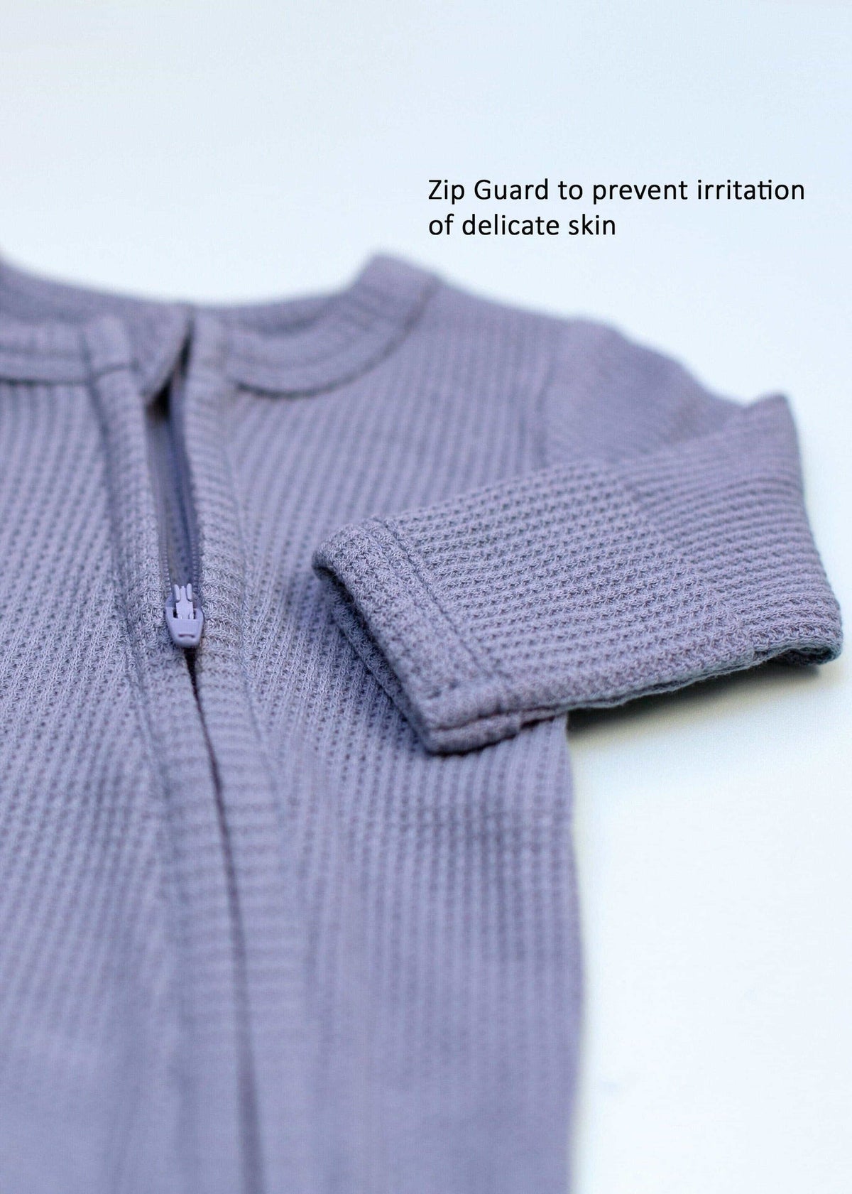 Zipped premature baby sleepsuit with fold-over mitts in blue, back view