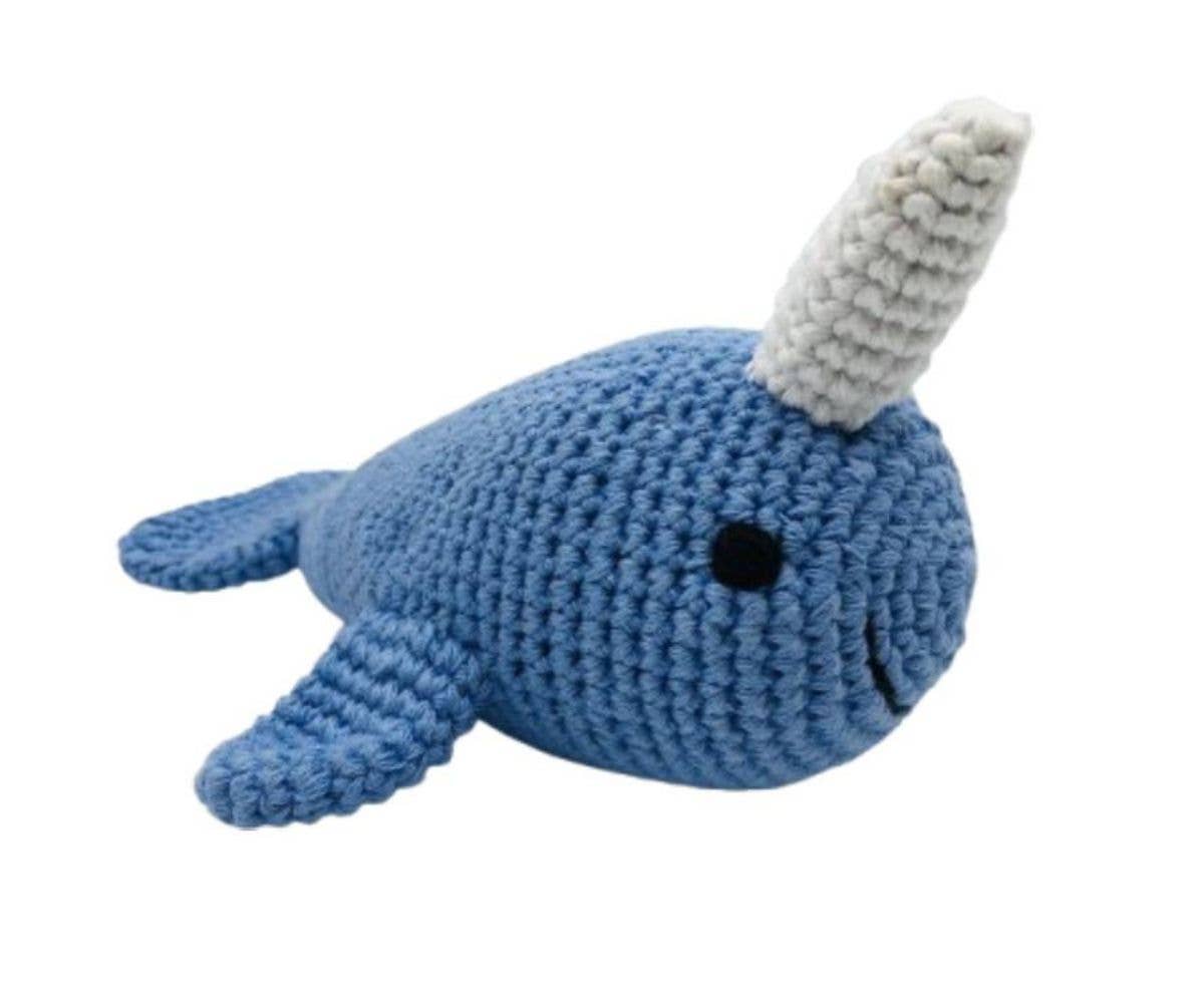 A blue crocheted narwhal plush toy with a white horn and a small black eye, shown on a plain white background. Perfect for a premature baby gift 