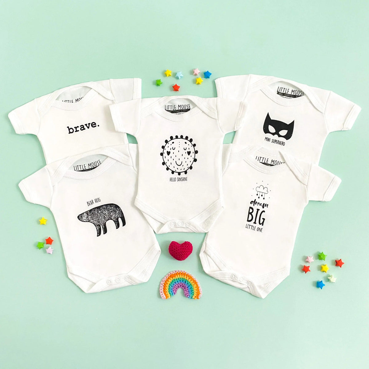 Pink "Brave" premature baby bodysuit, front view